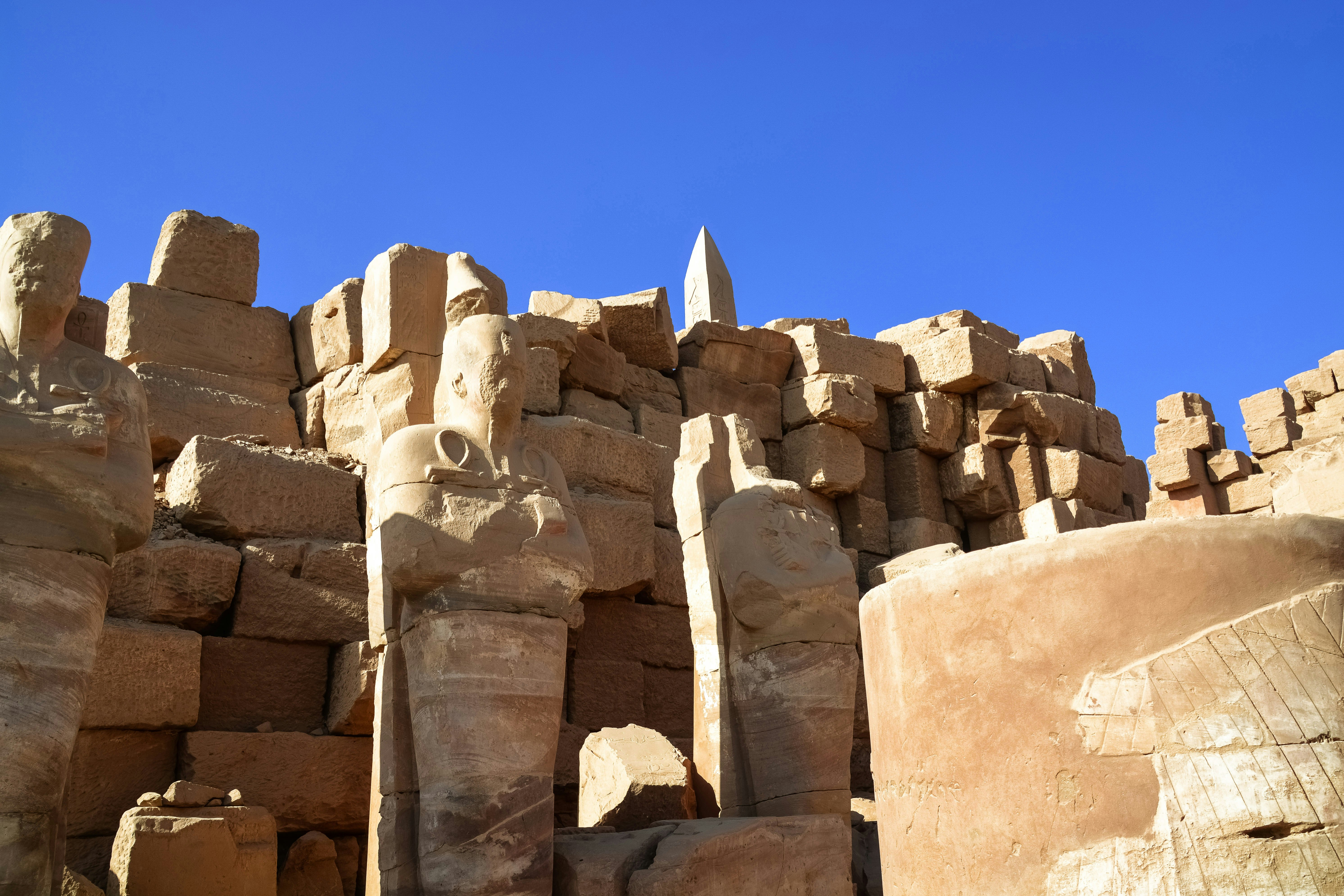 brown rock formation under blue sky during daytime